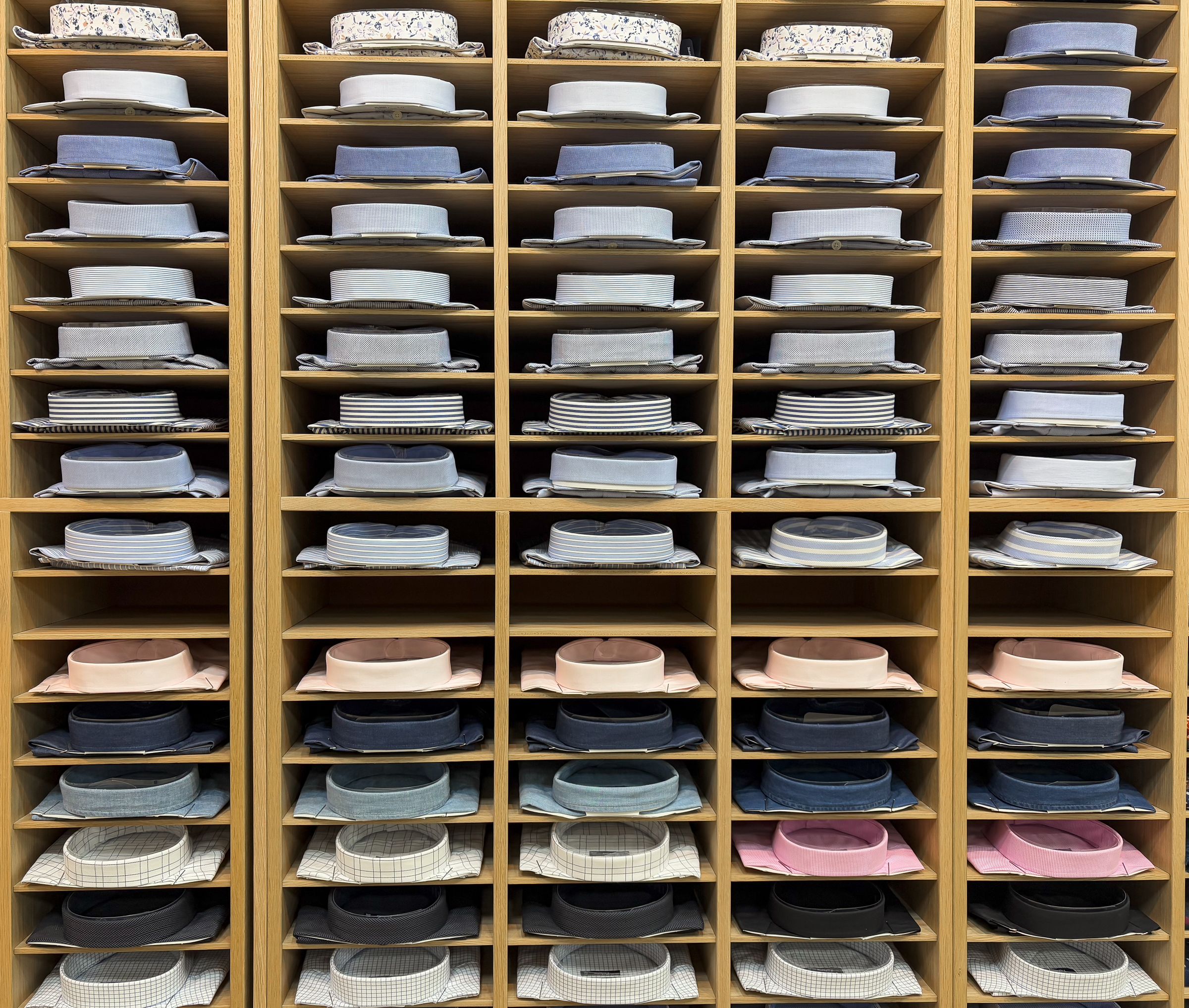 Neatly folded and stacked finished garments